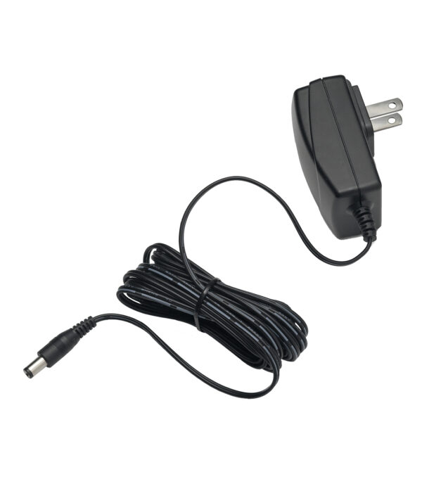 Black AC power adapter with two-prong plug and coiled cord ending in a barrel connector.