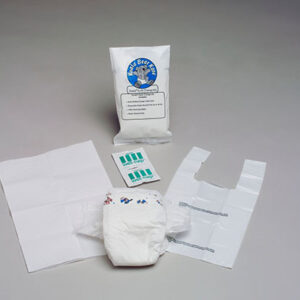 Diaper changing kit with diaper, absorbent pad, test strips, plastic liner, and sealed bag.