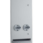 Metal vending machine with two 25¢ coin slots, lock, and bottom dispensing tray.