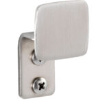 Metal wall-mounted hook with rectangular front plate and two screws for attachment.