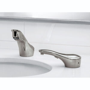 Modern chrome faucet and soap dispenser on a white countertop with tiled wall background.