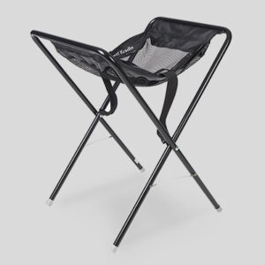 Portable foldable stool with metal legs and fabric seat for easy transport and storage.