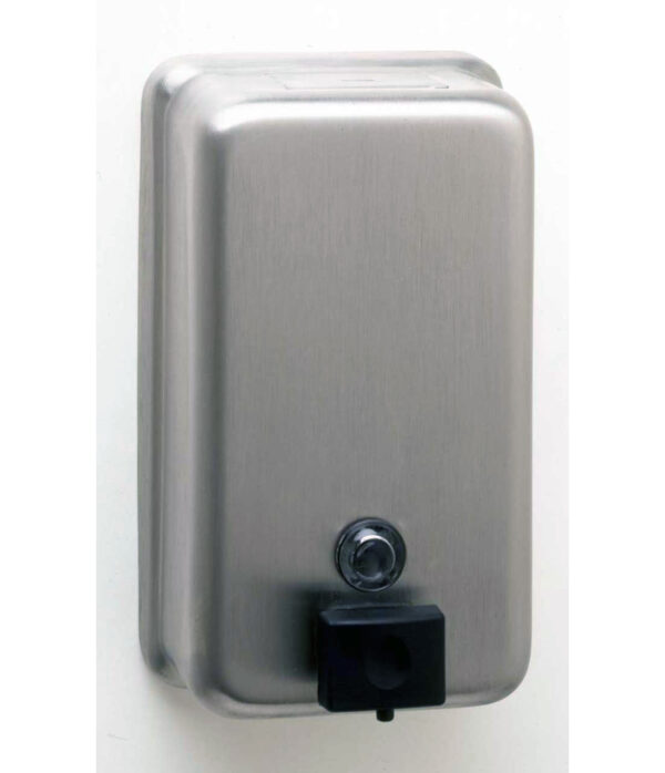 Wall-mounted stainless steel soap dispenser with push button and black nozzle.