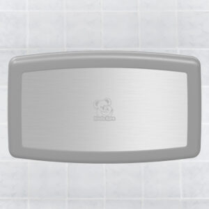 Gray wall-mounted baby changing station with Koala Kare logo on a tiled background.