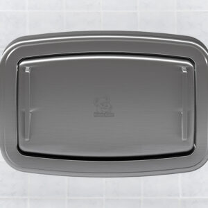 Stainless steel baby changing station on tiled wall, lid closed with logo in center.