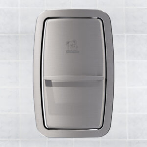 Stainless steel wall-mounted paper towel dispenser against tiled background.