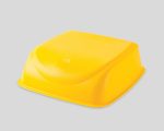 Yellow rectangular plastic cover with smooth edges on a flat surface.