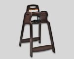 Brown high chair with safety harness and warning label for small children.