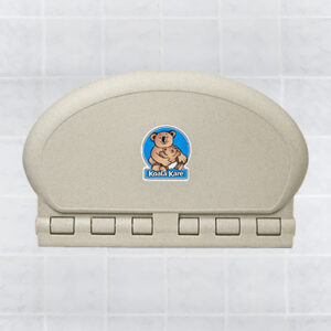 Gray wall-mounted baby changing station with Koala Kare logo on tiled wall background.