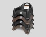 Stacked dark high chairs with handles and front labels.